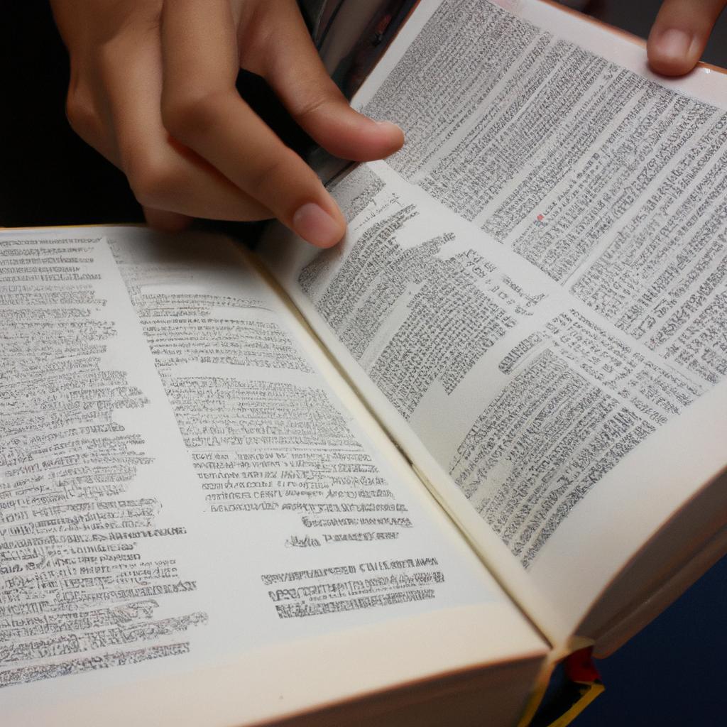 Person reading reference dictionary